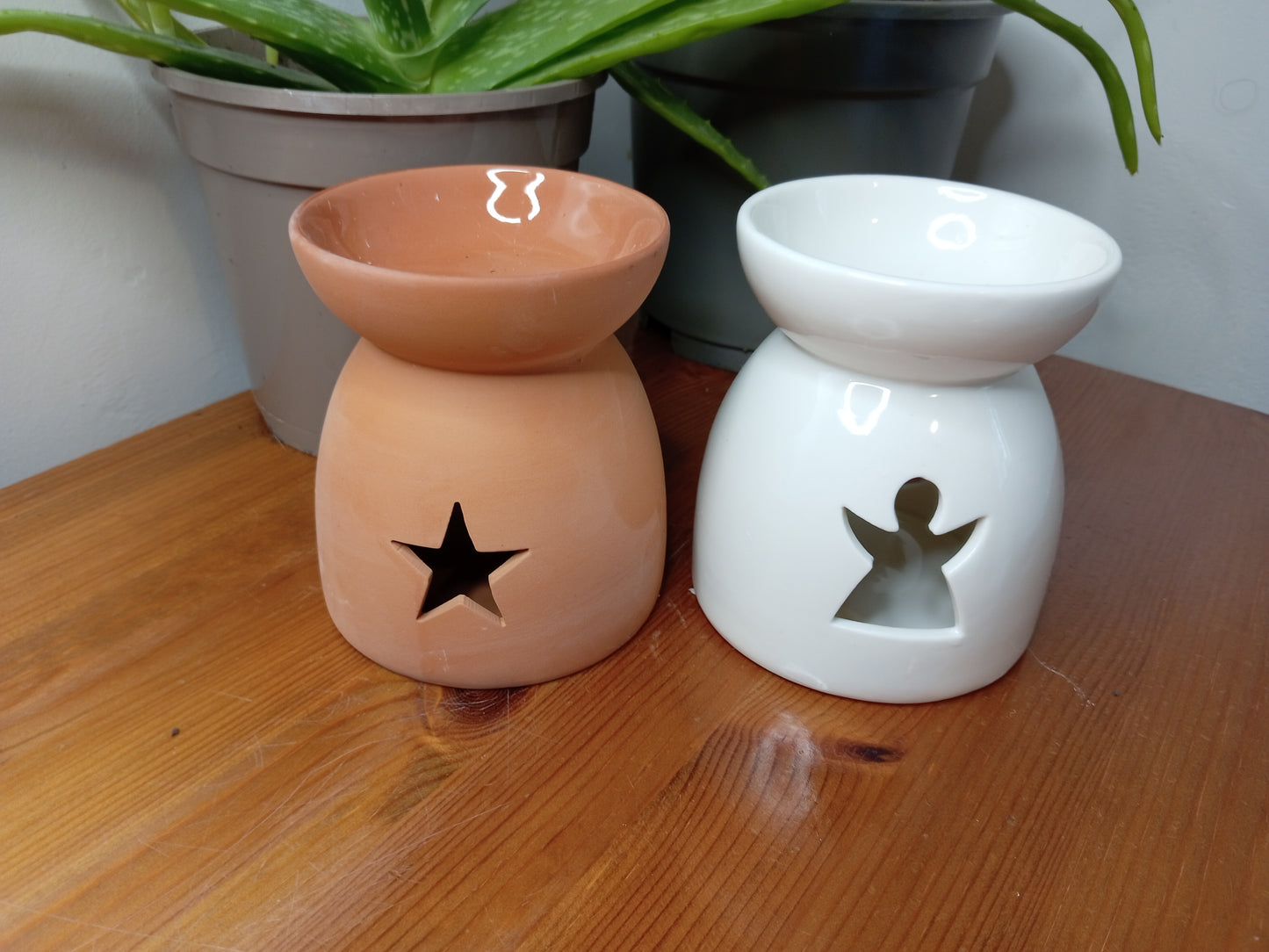 Cut out star and angel wax burners