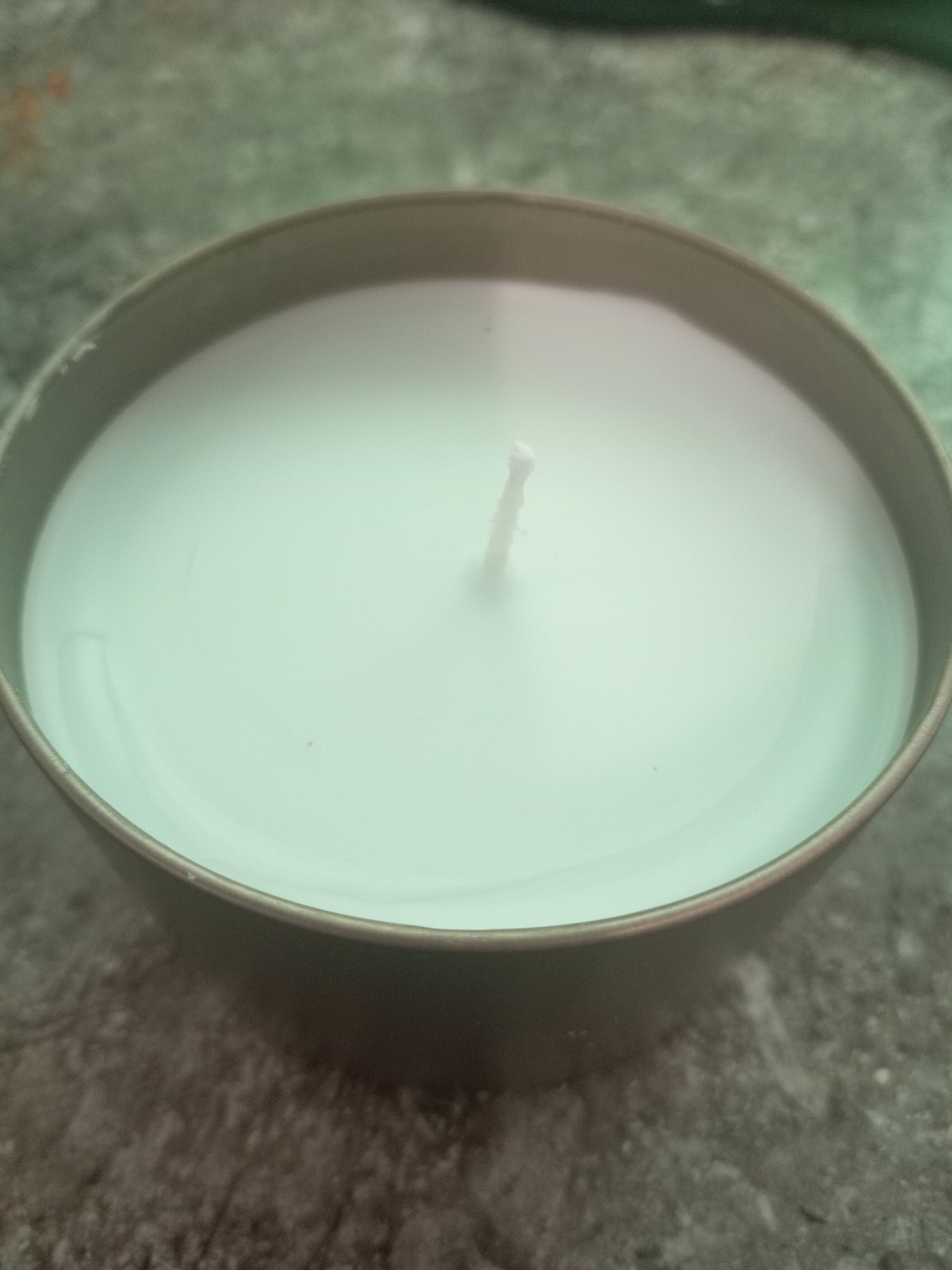 candle in a tin