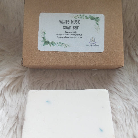 white bar of soap with brown box